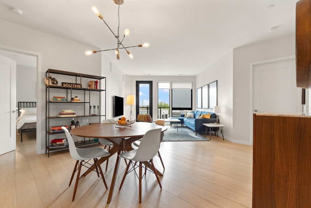 45 West 3rd Street, Unit 512 Boston, MA 02127 - Photo 12 of 40 a view of a a dining room with furniture window and wooden floor