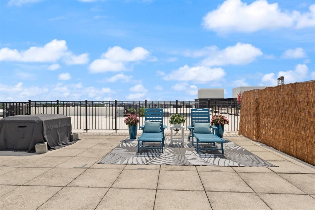 45 West 3rd Street, Unit 512 Boston, MA 02127 - Photo 29 of 40 a view of a terrace with seating space
