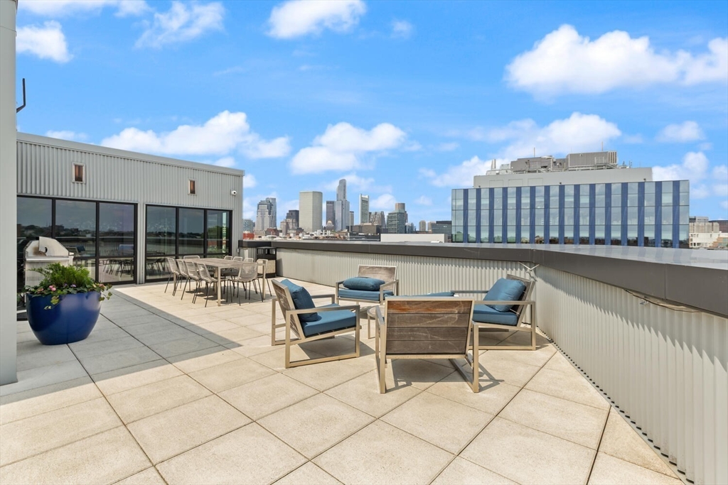 45 West 3rd Street, Unit 512 Boston, MA 02127 - Photo 39 of 40 a view of a terrace with seating space