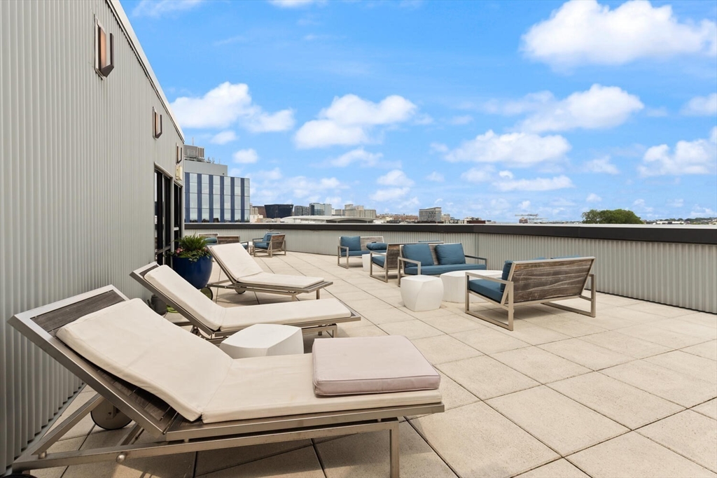 45 West 3rd Street, Unit 512 Boston, MA 02127 - Photo 40 of 40 a terrace with outdoor seating and city view