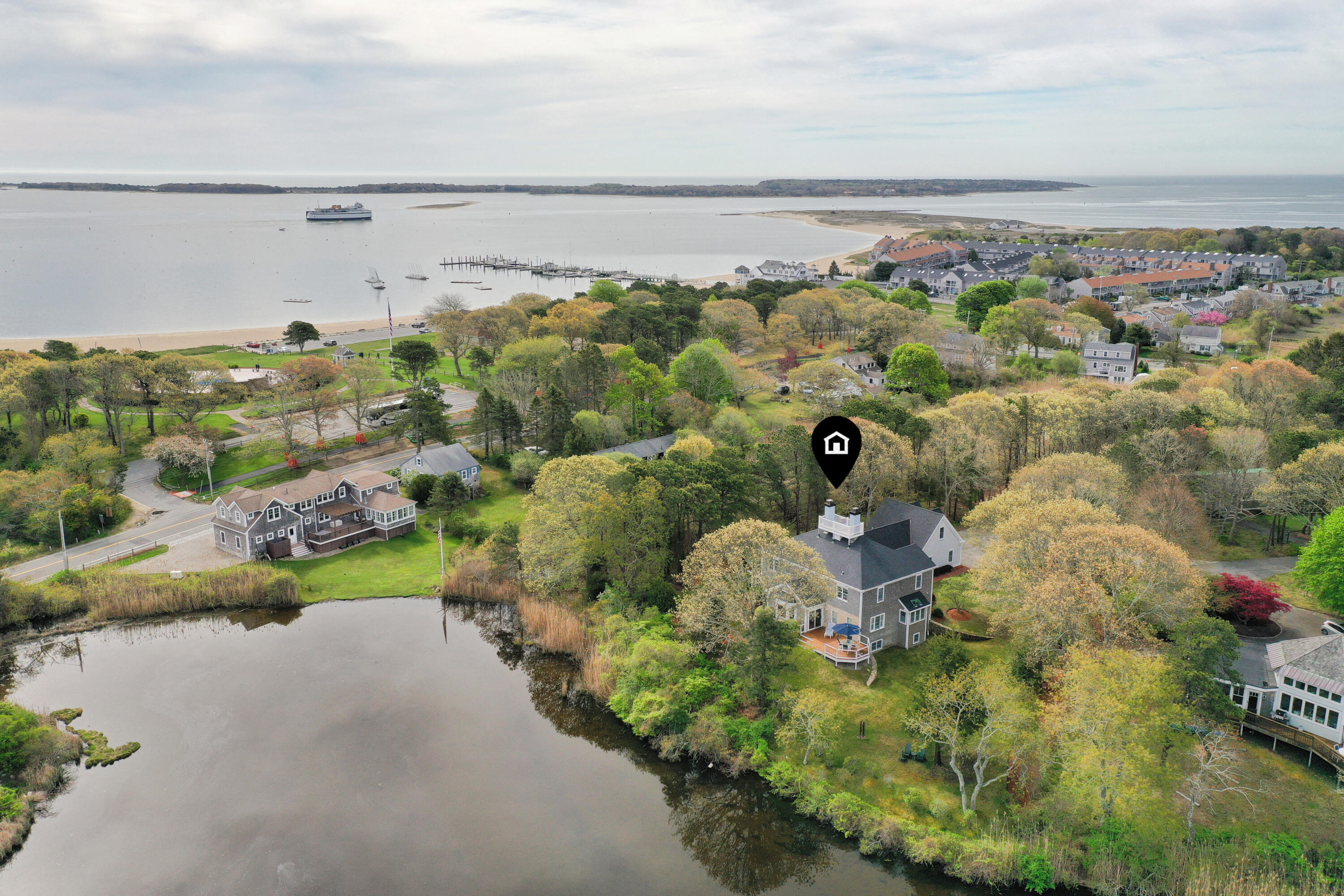 20 Stanley Place Hyannis, MA 02601 - Photo 1 of 37 a view of a lake in middle of forest
