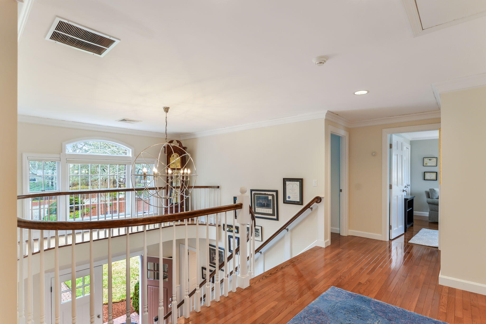 20 Stanley Place Hyannis, MA 02601 - Photo 26 of 37 a view of staircase with white walls and wooden floor