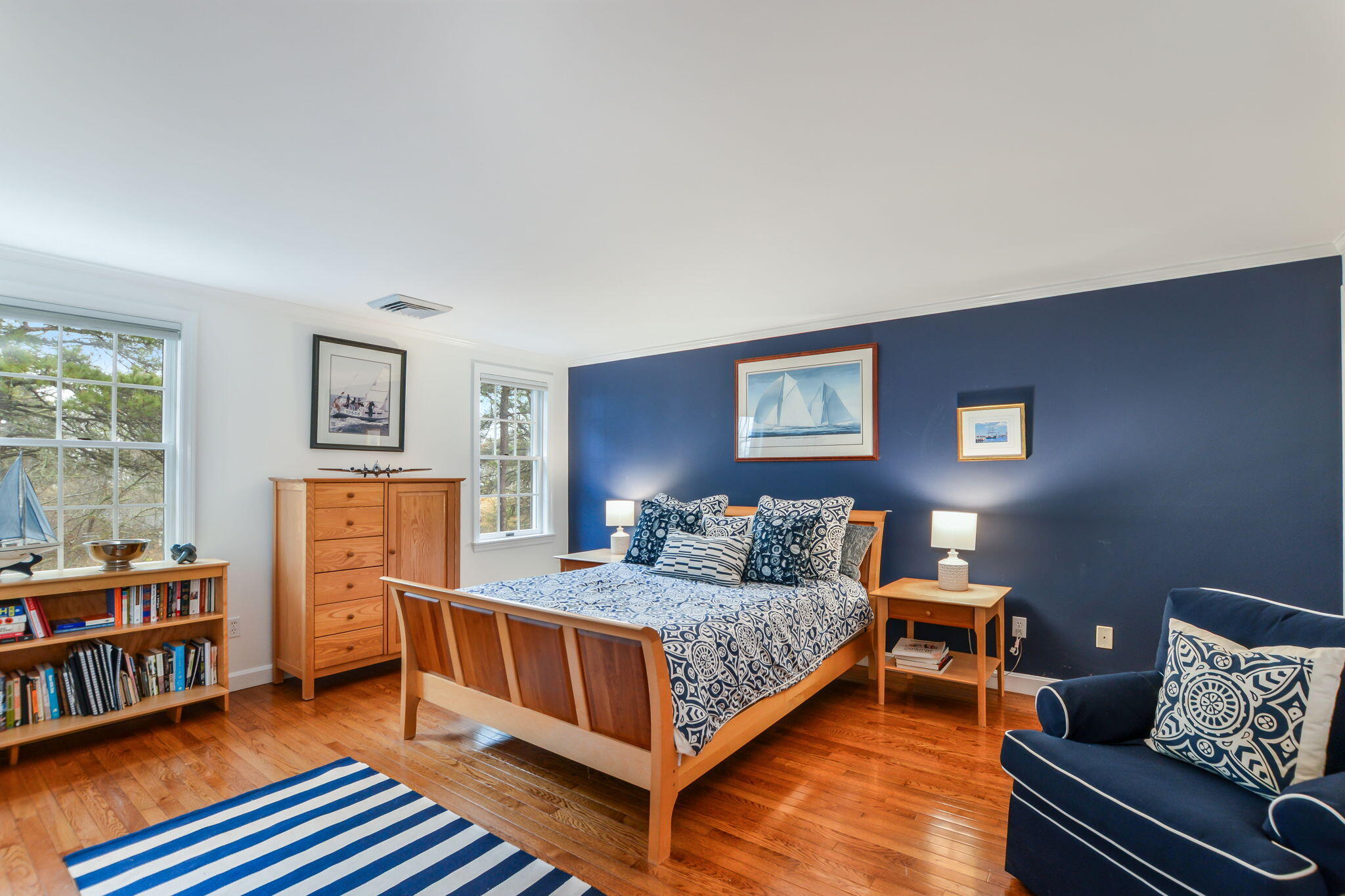 20 Stanley Place Hyannis, MA 02601 - Photo 27 of 37 a bedroom with furniture and a book shelf