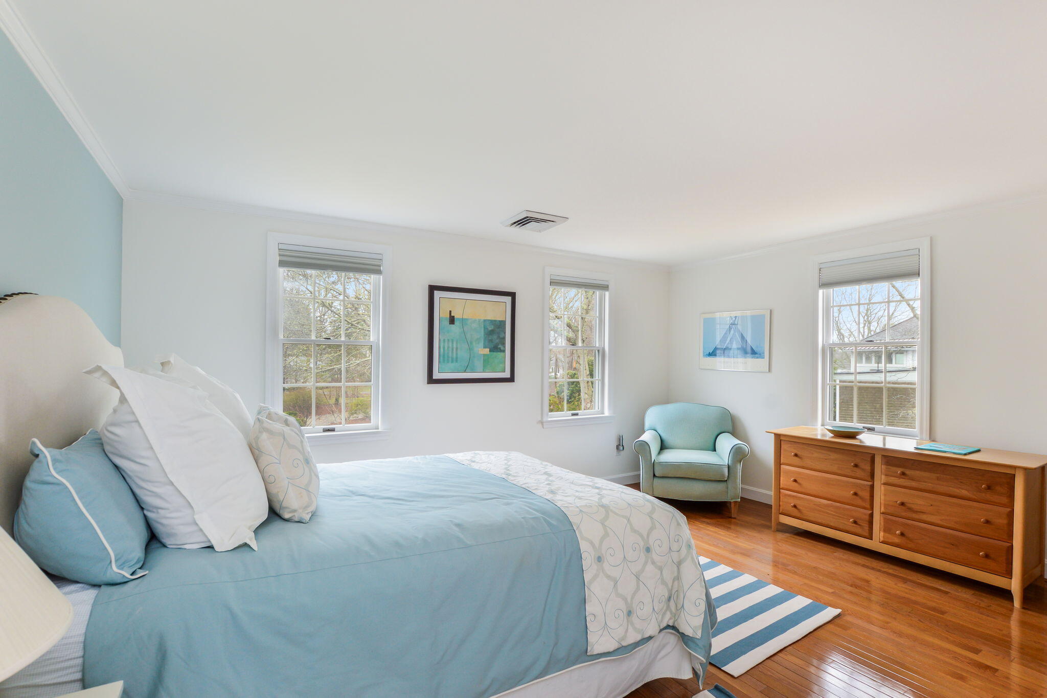 20 Stanley Place Hyannis, MA 02601 - Photo 28 of 37 a bedroom with a bed and wooden floor