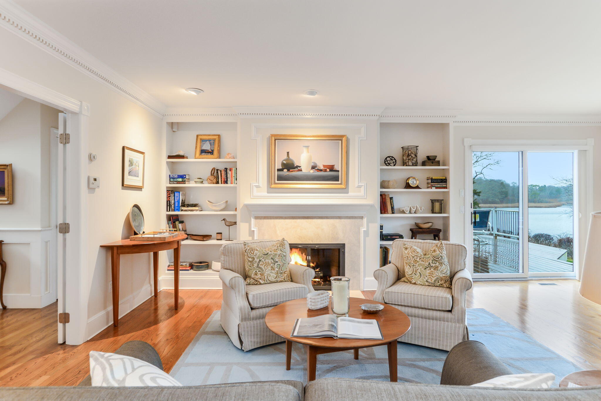 20 Stanley Place Hyannis, MA 02601 - Photo 9 of 37 a living room with furniture and a fireplace