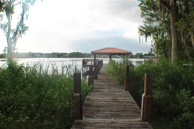 a view of a lake with a patio