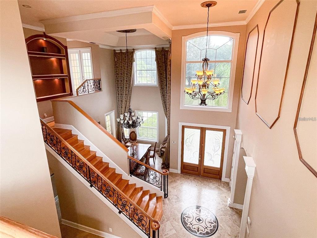 13161 Lake Butler Boulevard Windermere, FL 34786 - Photo 7 of 30 a view of an entryway with wooden floor