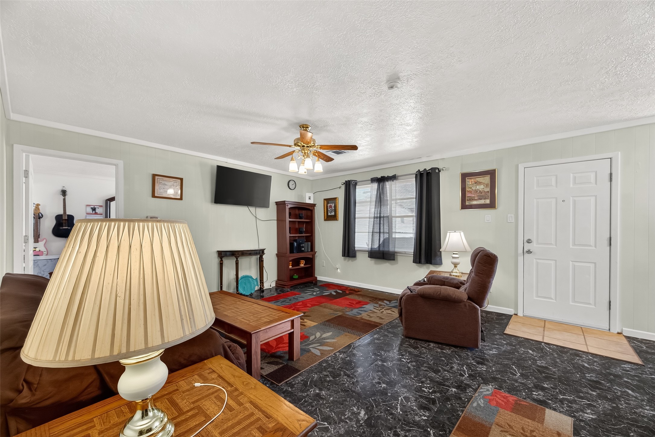 4802 Mistletoe Road Pasadena, TX 77505 - Photo 11 of 41 a living room with furniture and a fireplace