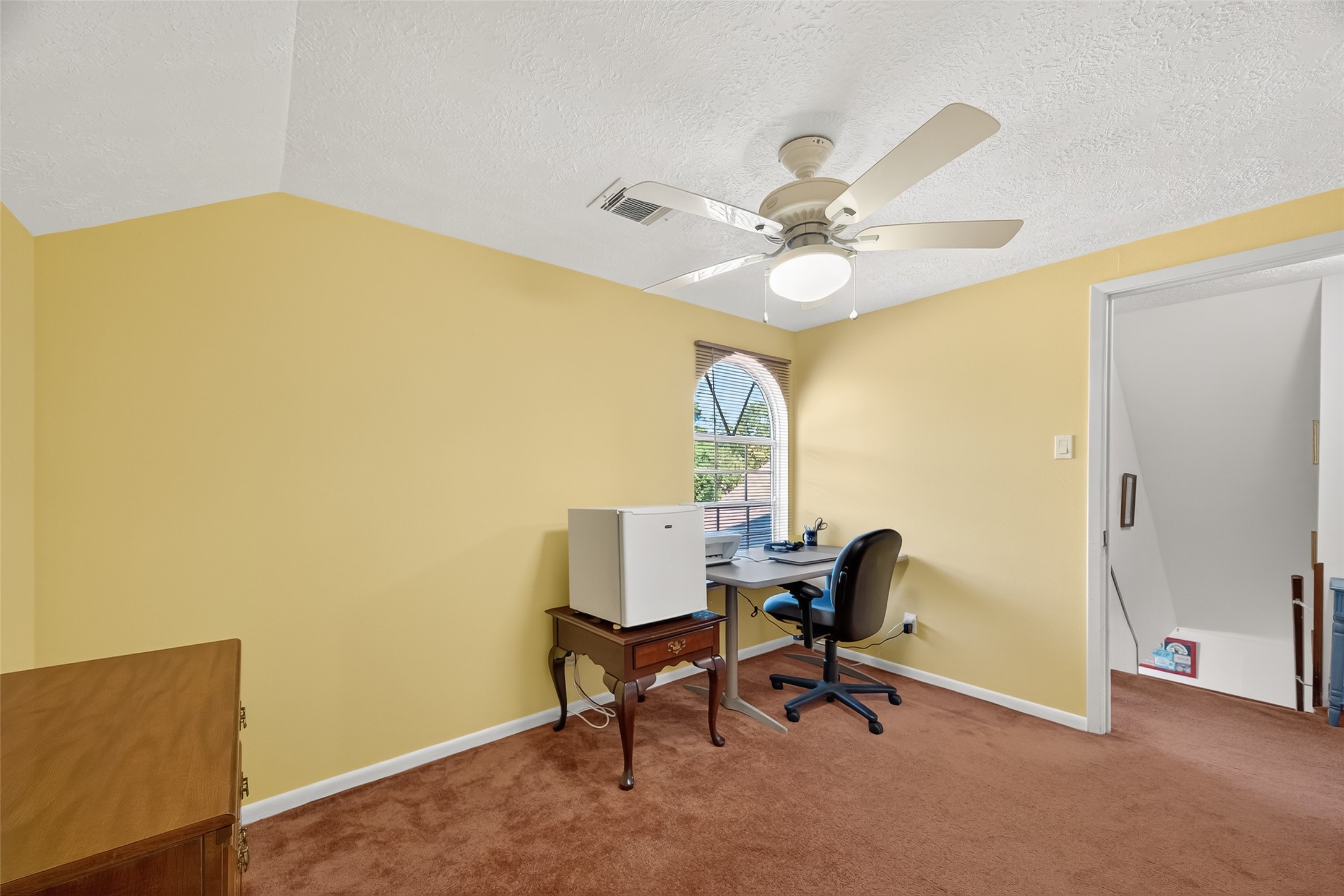 4802 Mistletoe Road Pasadena, TX 77505 - Photo 23 of 41 a view of a workspace with furniture and a ceiling fan
