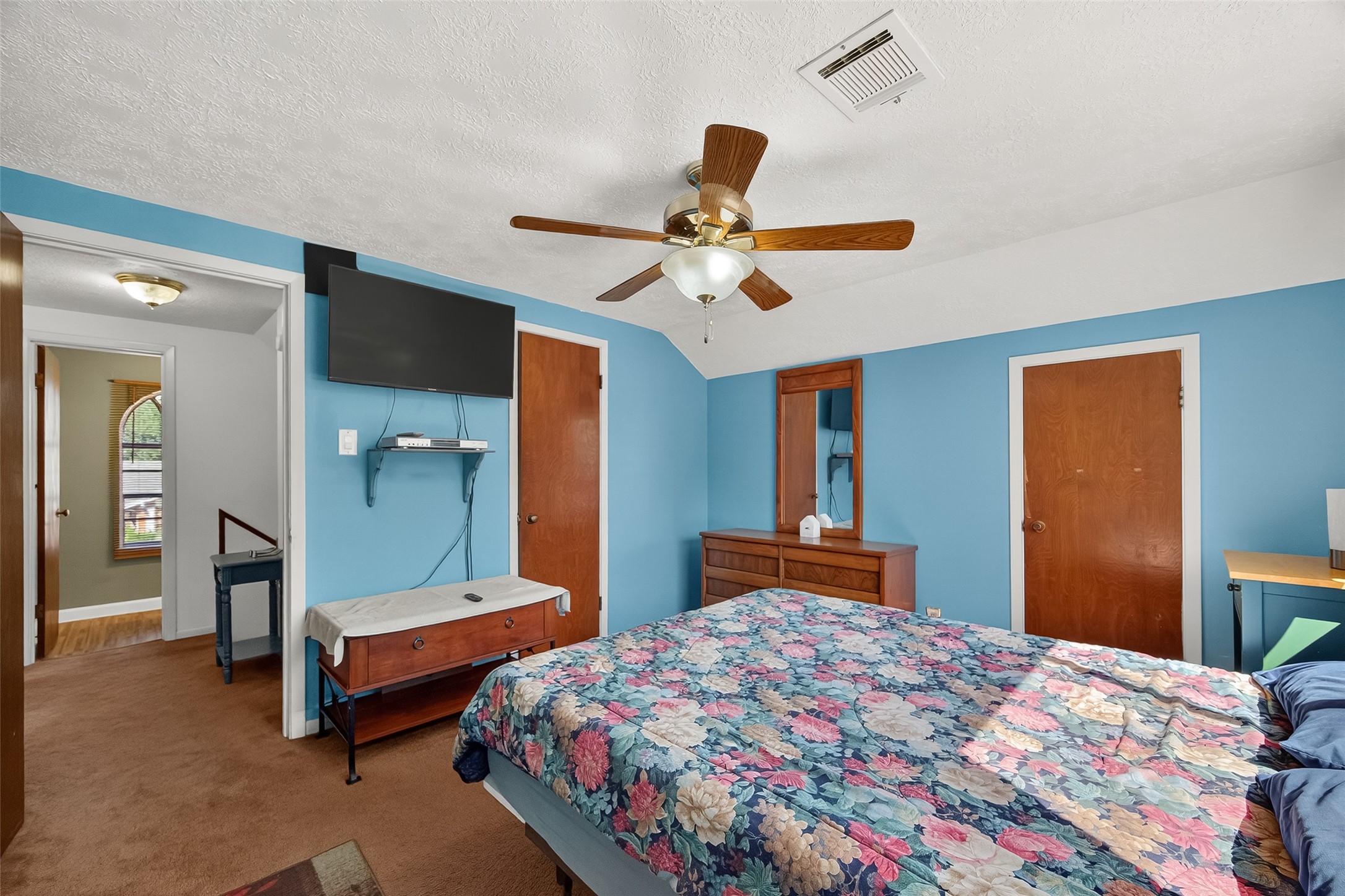 4802 Mistletoe Road Pasadena, TX 77505 - Photo 26 of 41 a bedroom with 2 bed and a chandelier