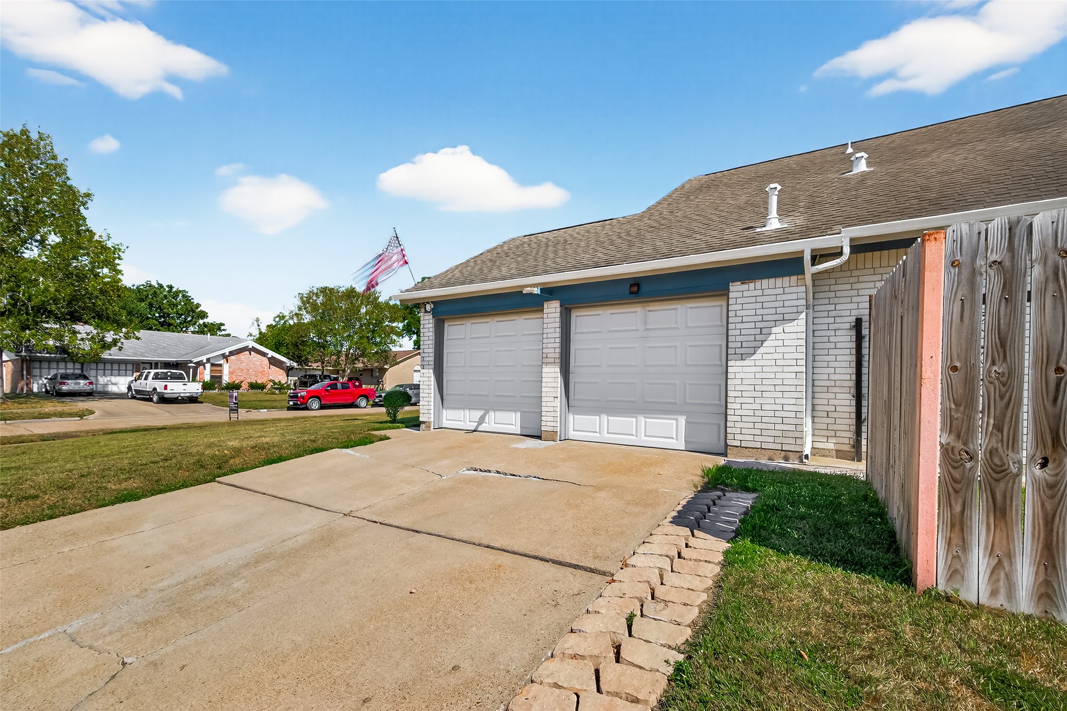 4802 Mistletoe Road Pasadena, TX 77505 - Photo 35 of 41 a front view of a house with a yard and garage