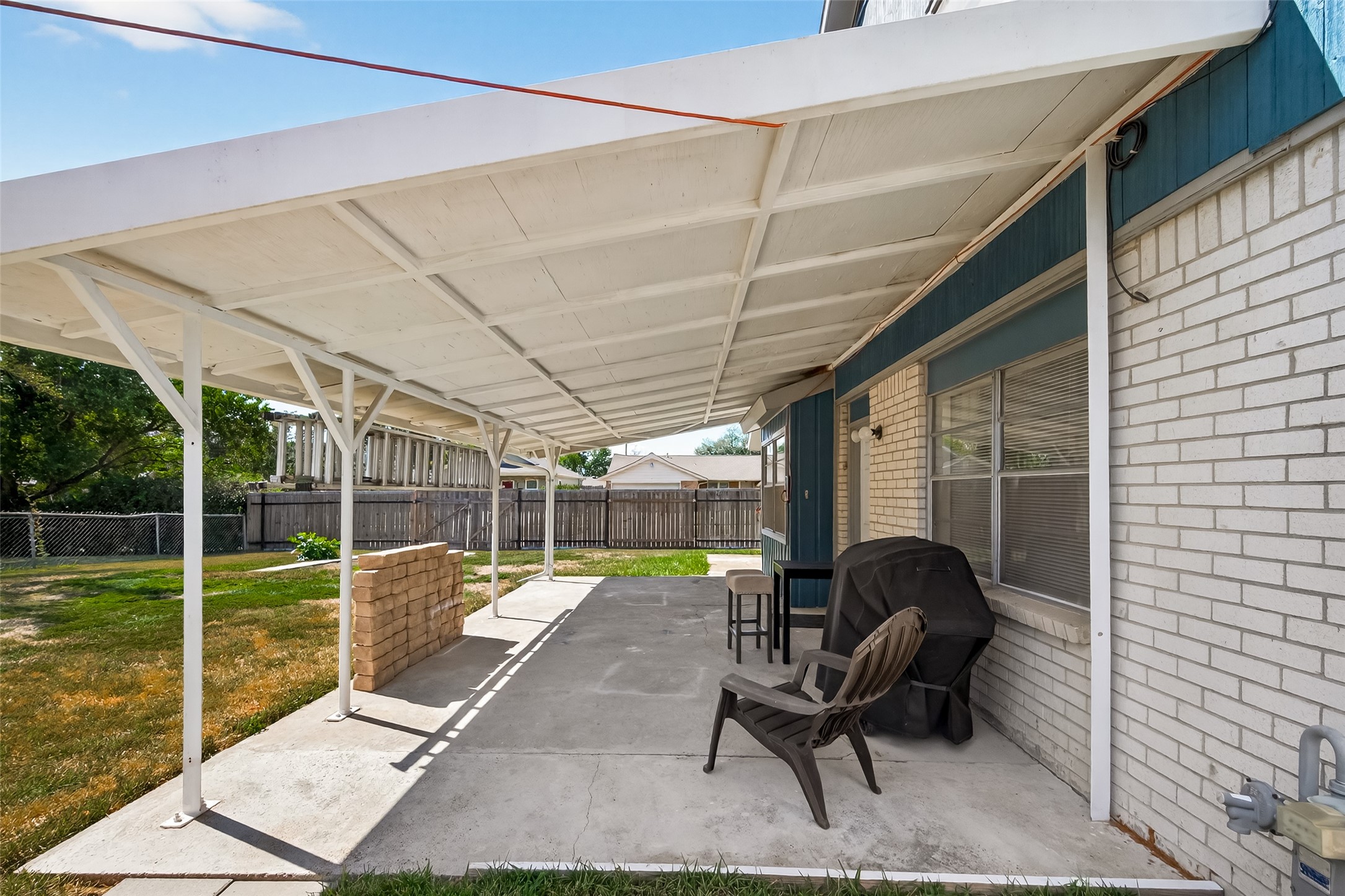 4802 Mistletoe Road Pasadena, TX 77505 - Photo 41 of 41 a view of a swimming pool with a patio and a yard