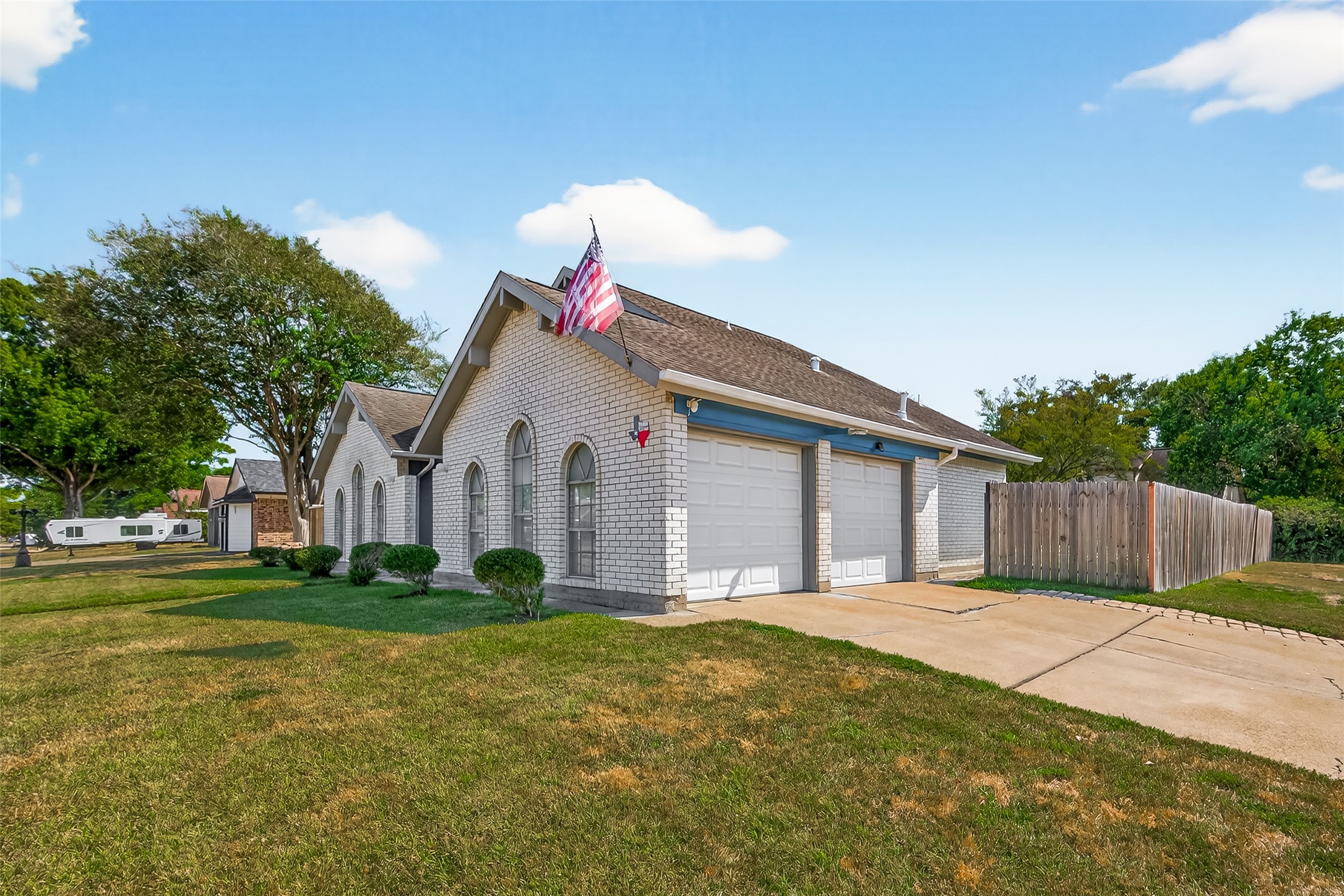 4802 Mistletoe Road Pasadena, TX 77505 - Photo 5 of 41 a view of a house with a yard and fence