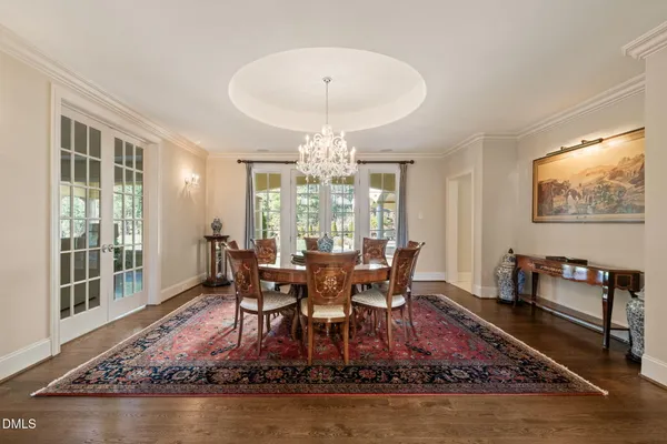 a living room with furniture kitchen view and a fireplace