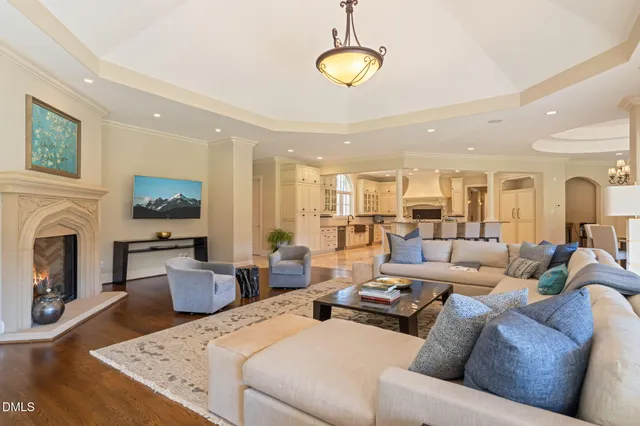 a bedroom with a bed and a fireplace