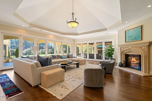a bedroom with a large bed and a large window