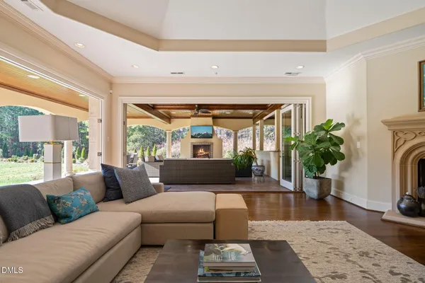 a bedroom with a bed and a fireplace