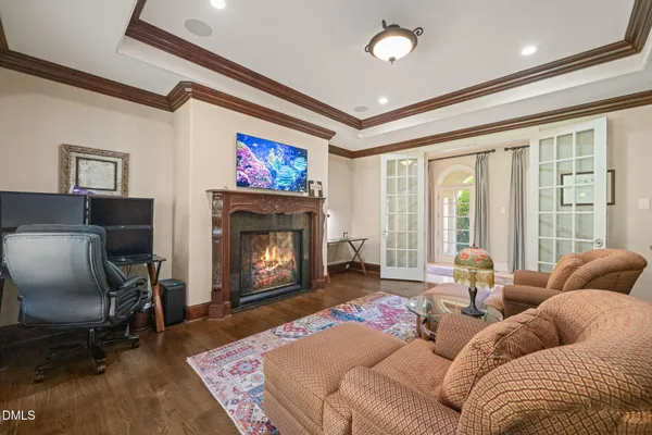 an aerial view of a house with a lake view