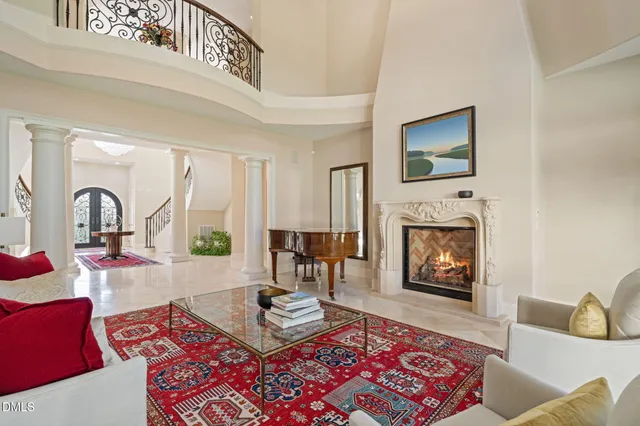 a view of a dining room with furniture and window