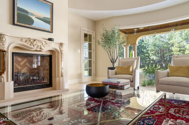 a large kitchen with stainless steel appliances kitchen island granite countertop a large counter top and a stove