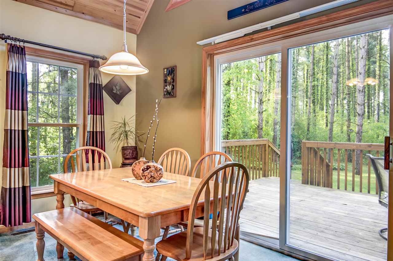 15813 Prairie Road South Beloit, IL 61080 - Photo 7 of 22 a view of a dining room with furniture window and outside view