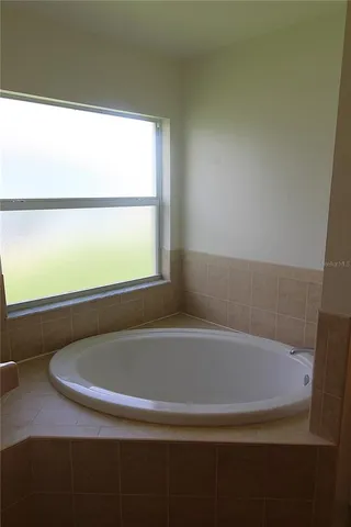a bathroom with a bathtub