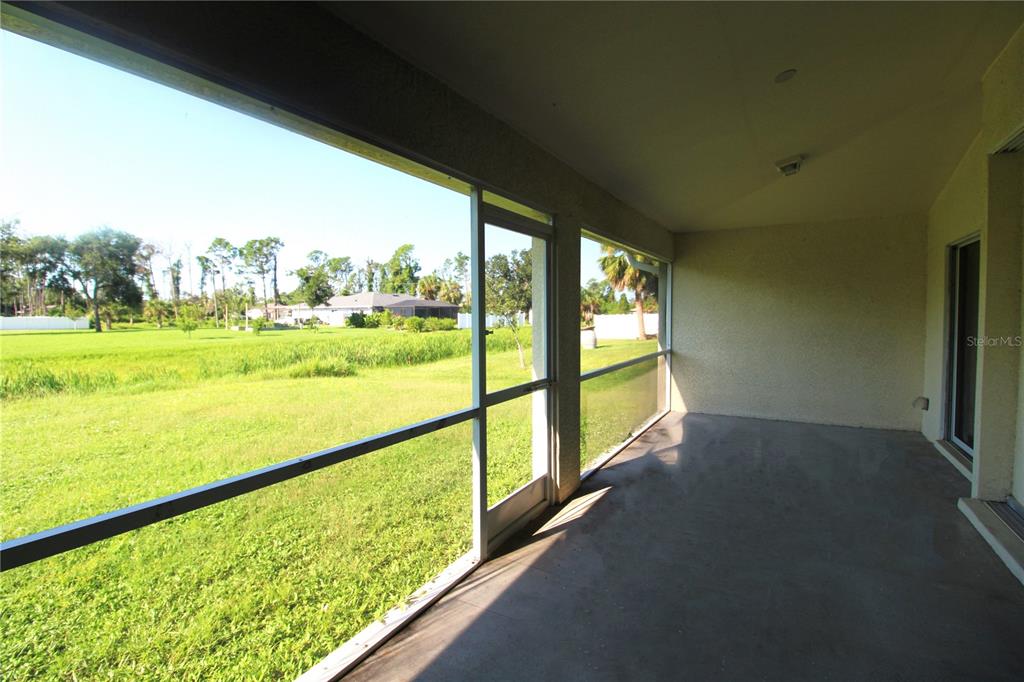 1489 Exchange Avenue North Port, FL 34288 - Photo 24 of 25 a view of an outdoor next to a yard