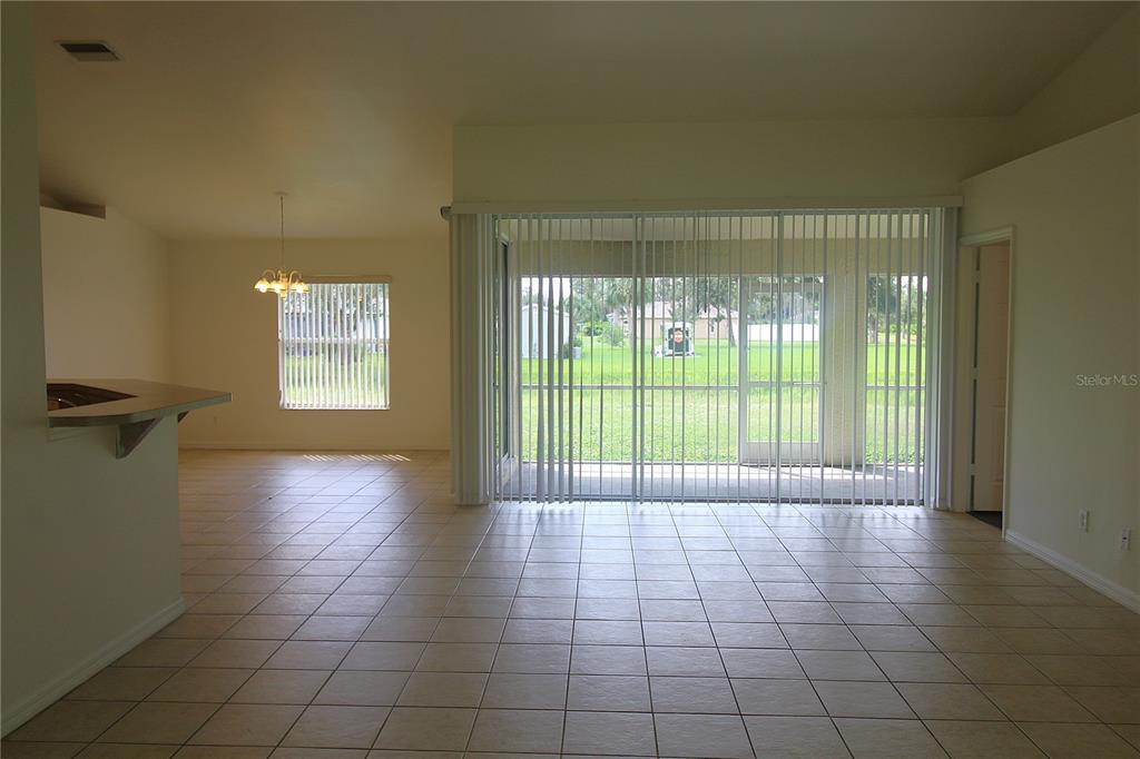 1489 Exchange Avenue North Port, FL 34288 - Photo 7 of 25 a view of an empty room with a window