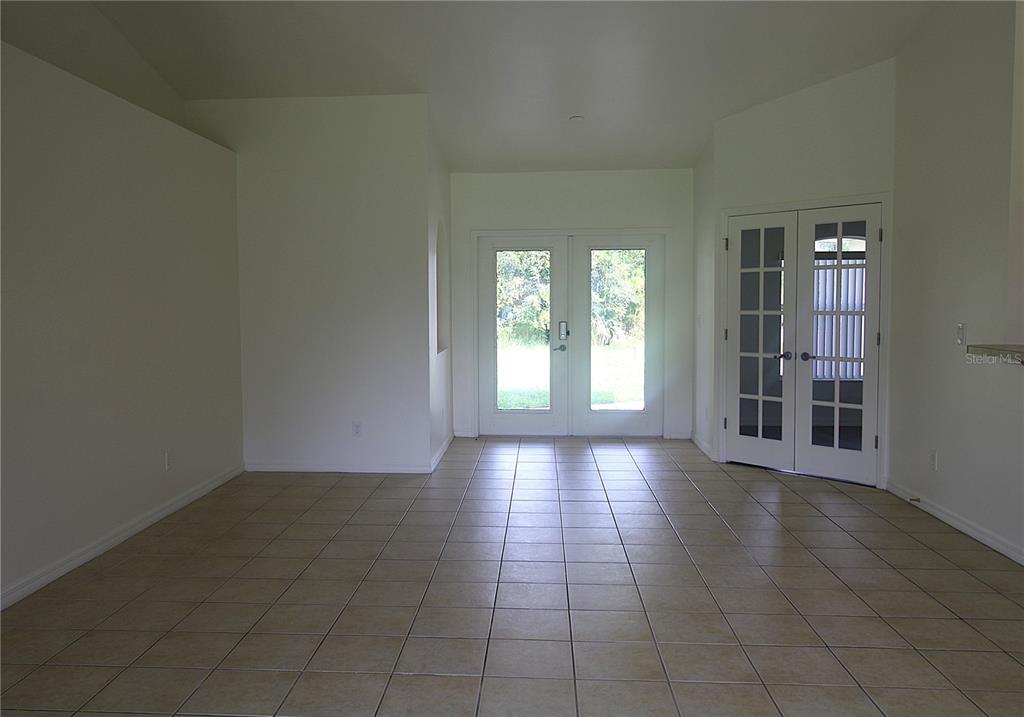 1489 Exchange Avenue North Port, FL 34288 - Photo 8 of 25 an empty room with windows