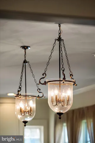 a front view of a house with a yard table and chairs