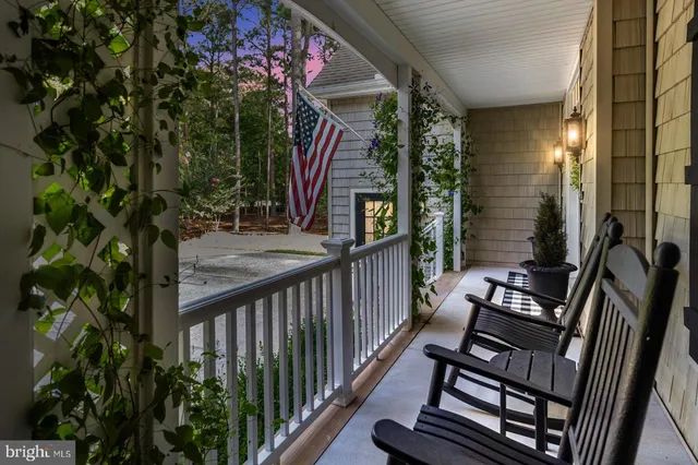 a view of staircase with a rug