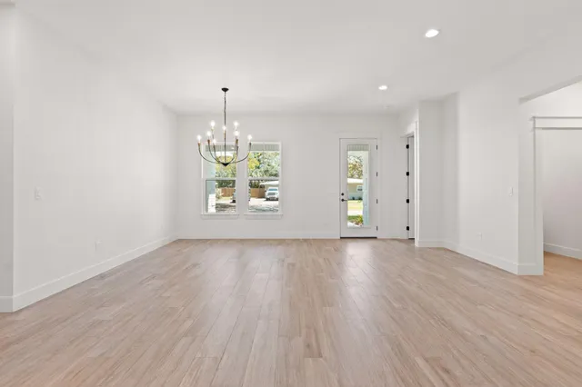 a white tub sitting in a bathroom