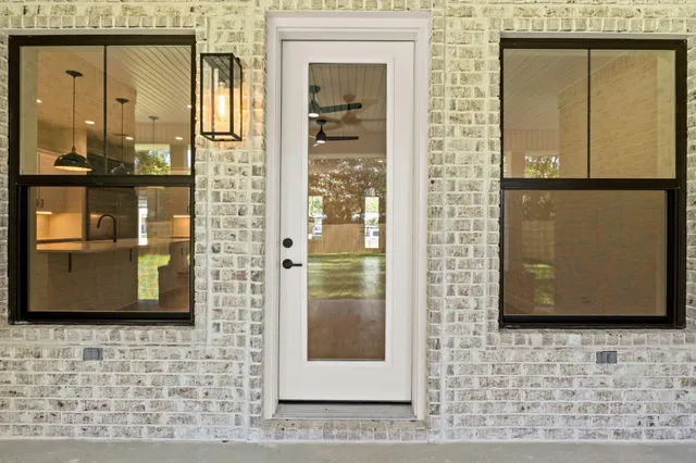 a kitchen with a refrigerator sink and microwave