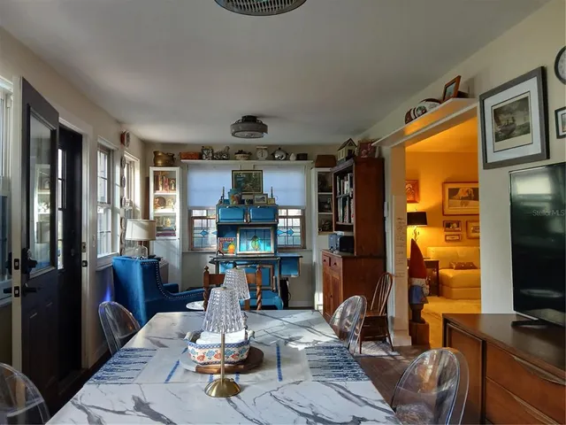 a view of a dining room with furniture