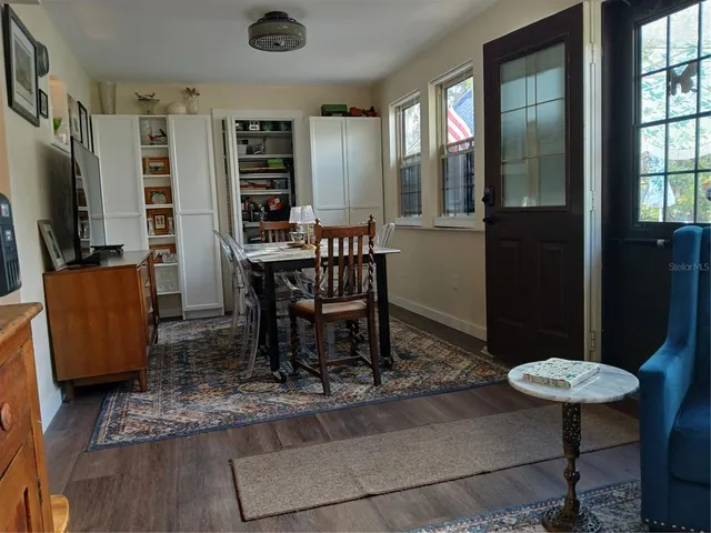 a bathroom with a granite countertop sink mirror and toilet