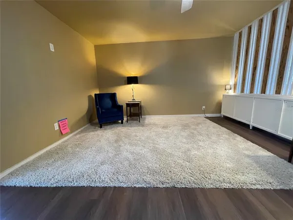 a kitchen with stainless steel appliances a refrigerator a sink a stove a microwave and cabinets