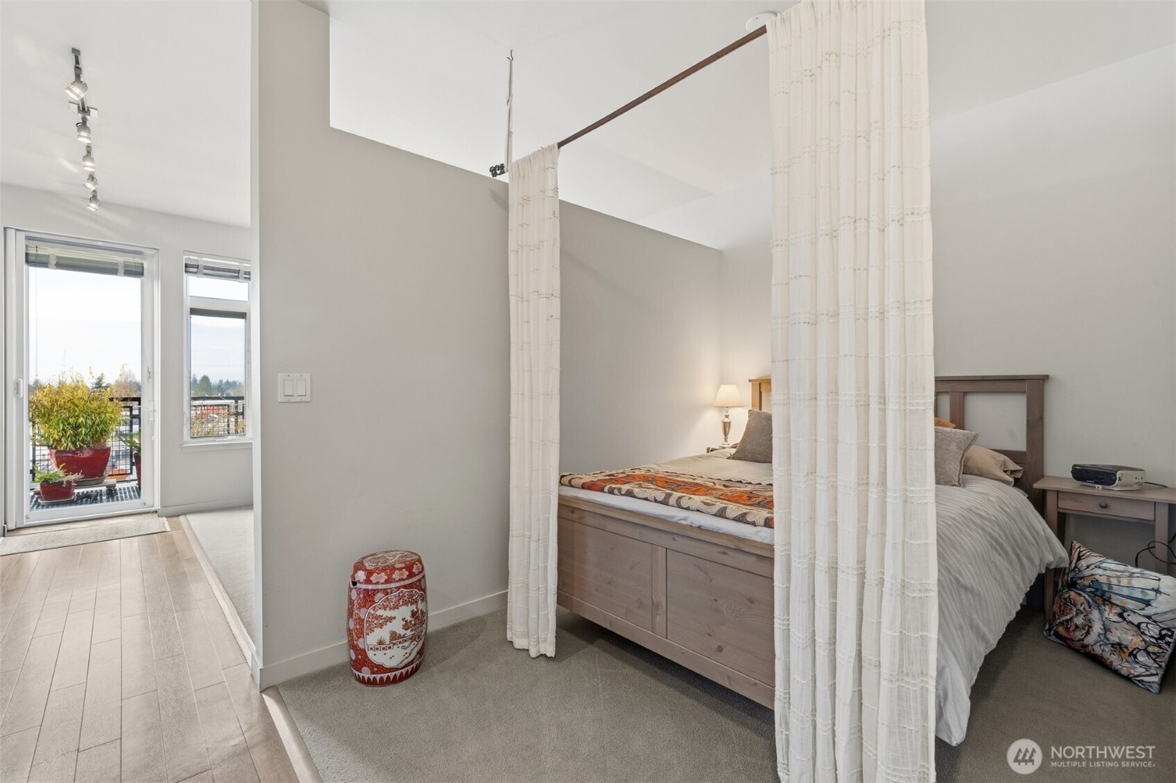 15100 6th Avenue Southwest, Unit 723 Burien, WA 98166 - Photo 5 of 23 a bedroom with a bed and a window