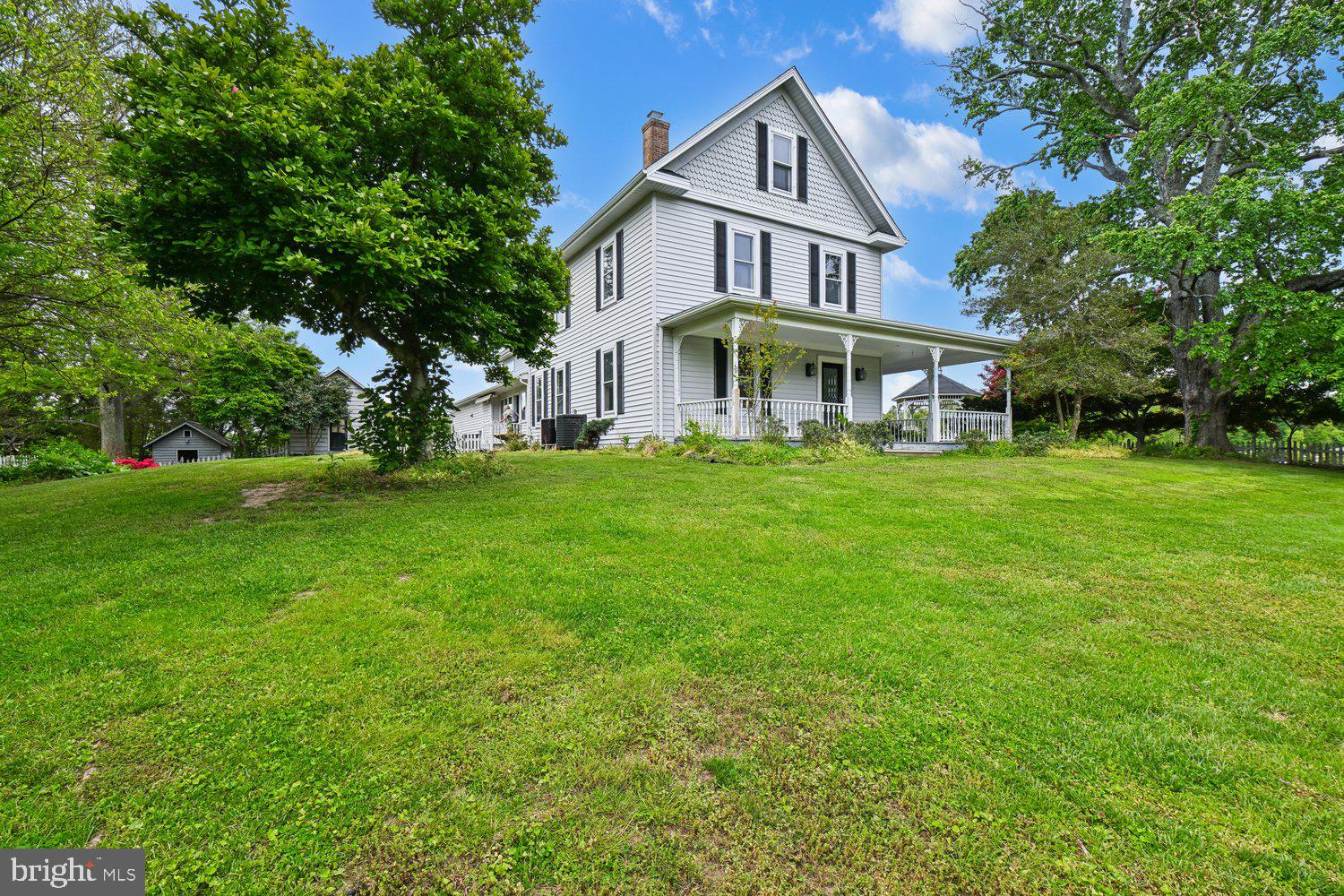 17401 Milltown Landing Road Brandywine, MD 20613 - Photo 1 of 96 a front view of a house with a garden