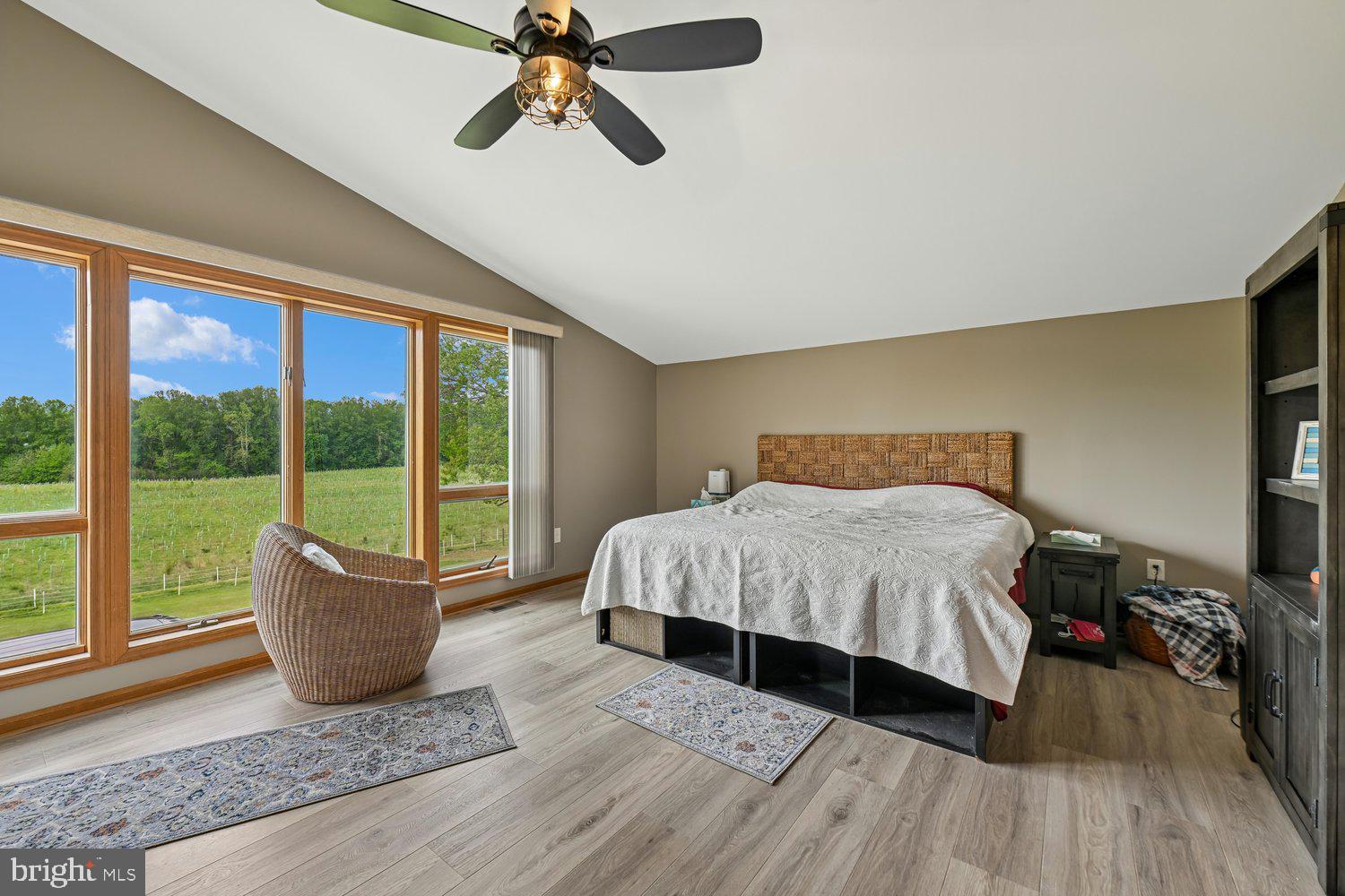 17401 Milltown Landing Road Brandywine, MD 20613 - Photo 18 of 96 a bedroom with a bed and large window