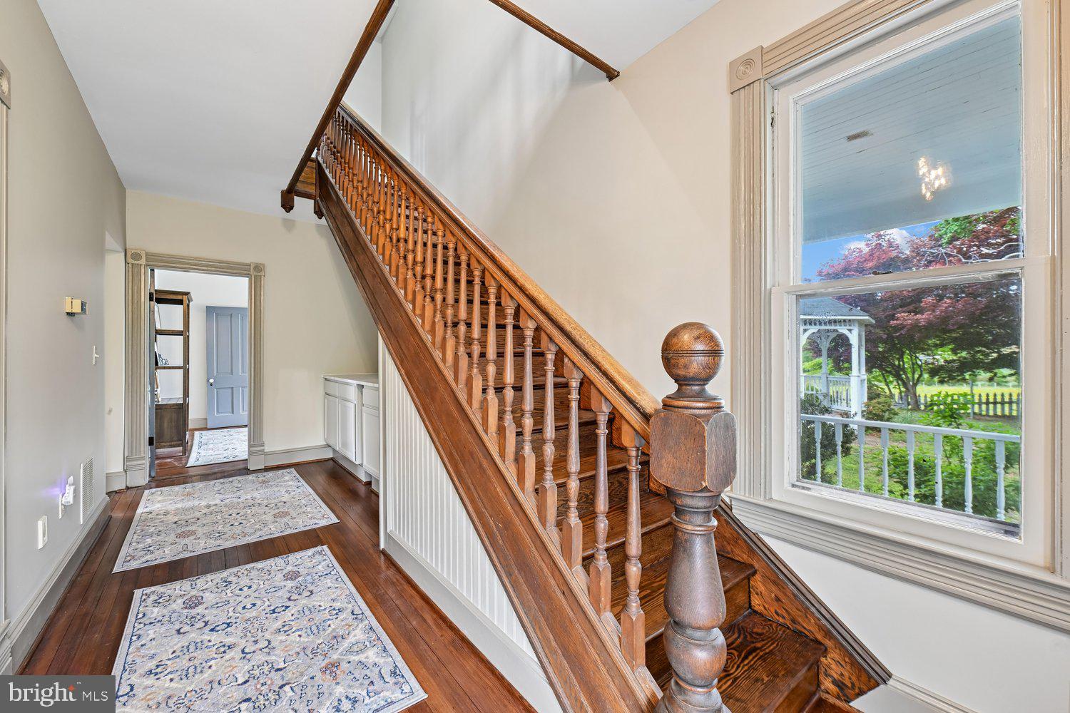 17401 Milltown Landing Road Brandywine, MD 20613 - Photo 21 of 96 Inviting entryway with classic wooden staircase.