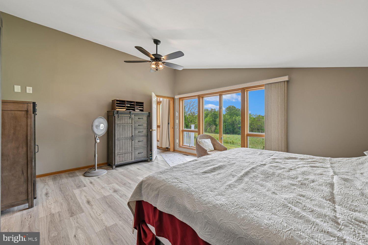 17401 Milltown Landing Road Brandywine, MD 20613 - Photo 44 of 96 a spacious bedroom with a large bed and a large window