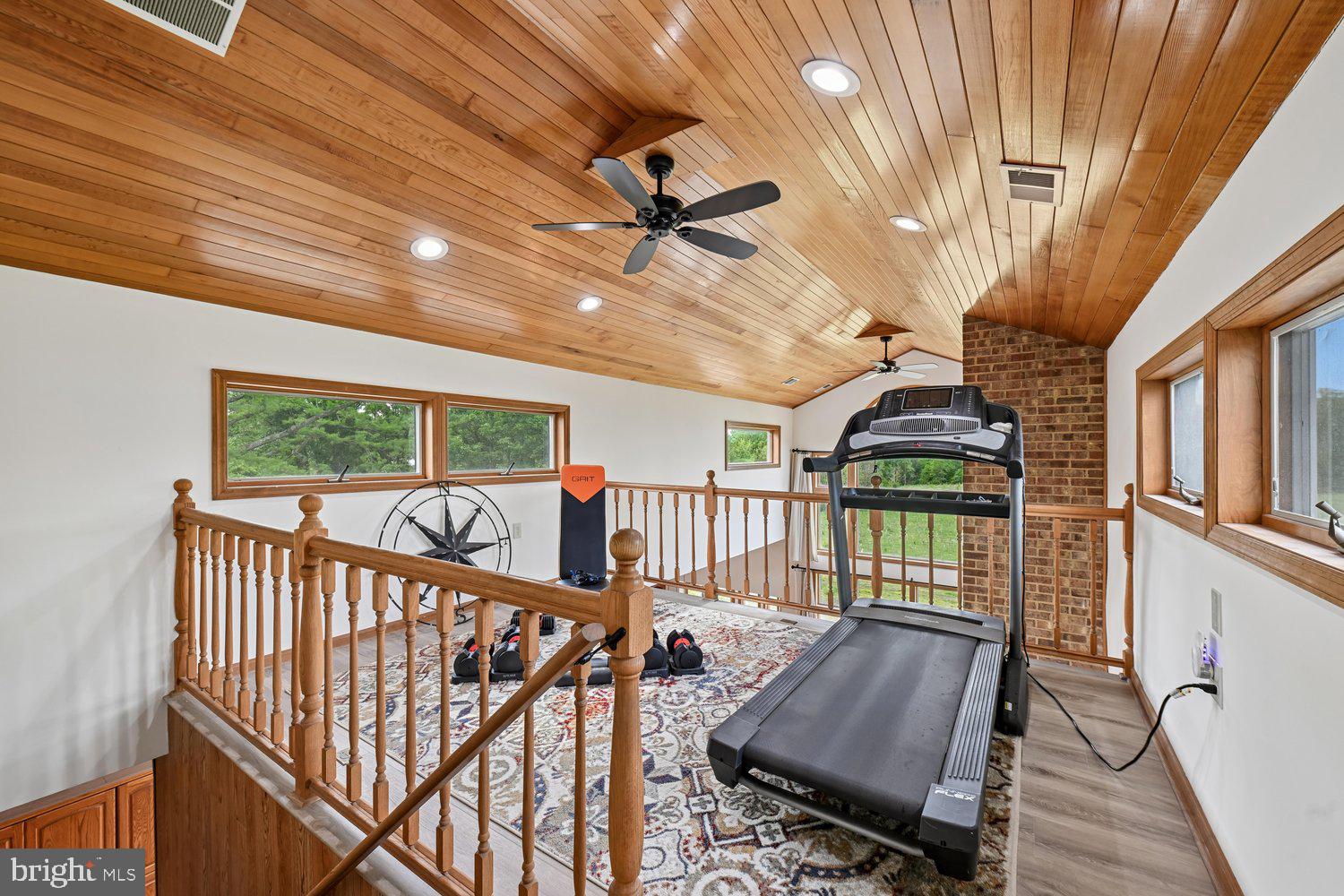 17401 Milltown Landing Road Brandywine, MD 20613 - Photo 58 of 96 Bright, airy fitness loft with wooden accents.