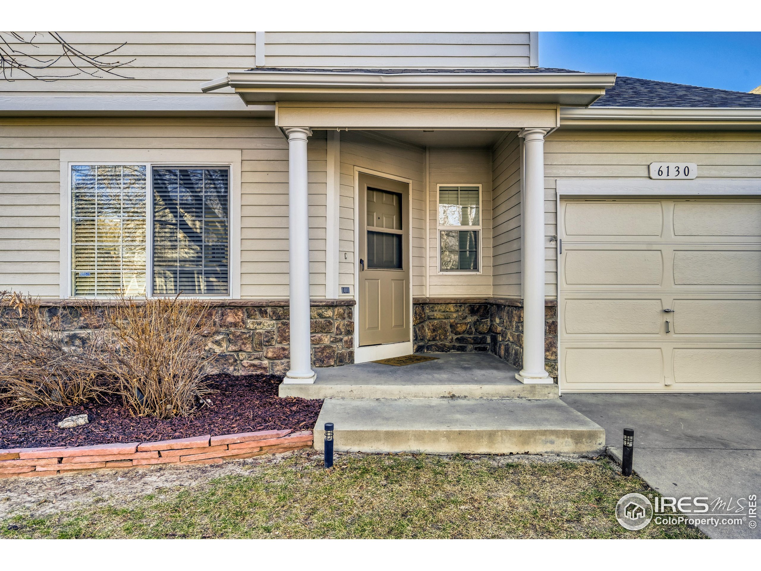 6130 Gorham Street Frederick, CO 80530 - Photo 3 of 48 a view of house with backyard porch and furniture