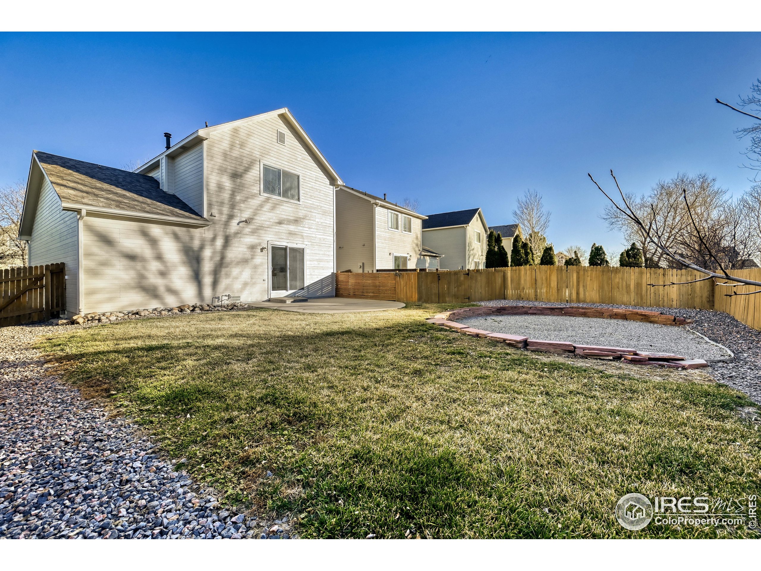 6130 Gorham Street Frederick, CO 80530 - Photo 45 of 48 a view of a house with a yard
