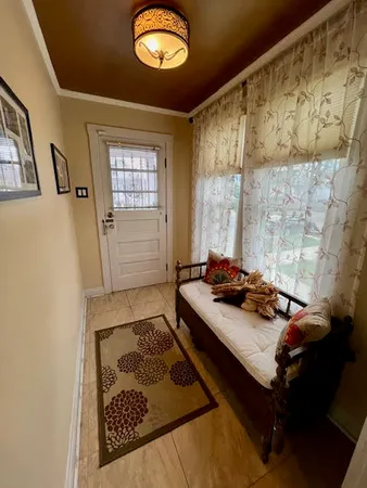 a room with furniture and a window