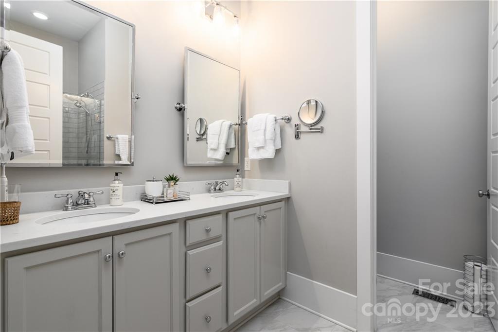205 Coneflower Place Fort Mill, SC 29708 - Photo 14 of 38 a bathroom with a granite countertop sink and a mirror
