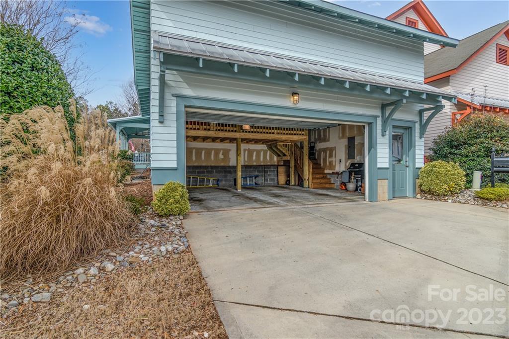 205 Coneflower Place Fort Mill, SC 29708 - Photo 24 of 38 front view of a brick house with a large window
