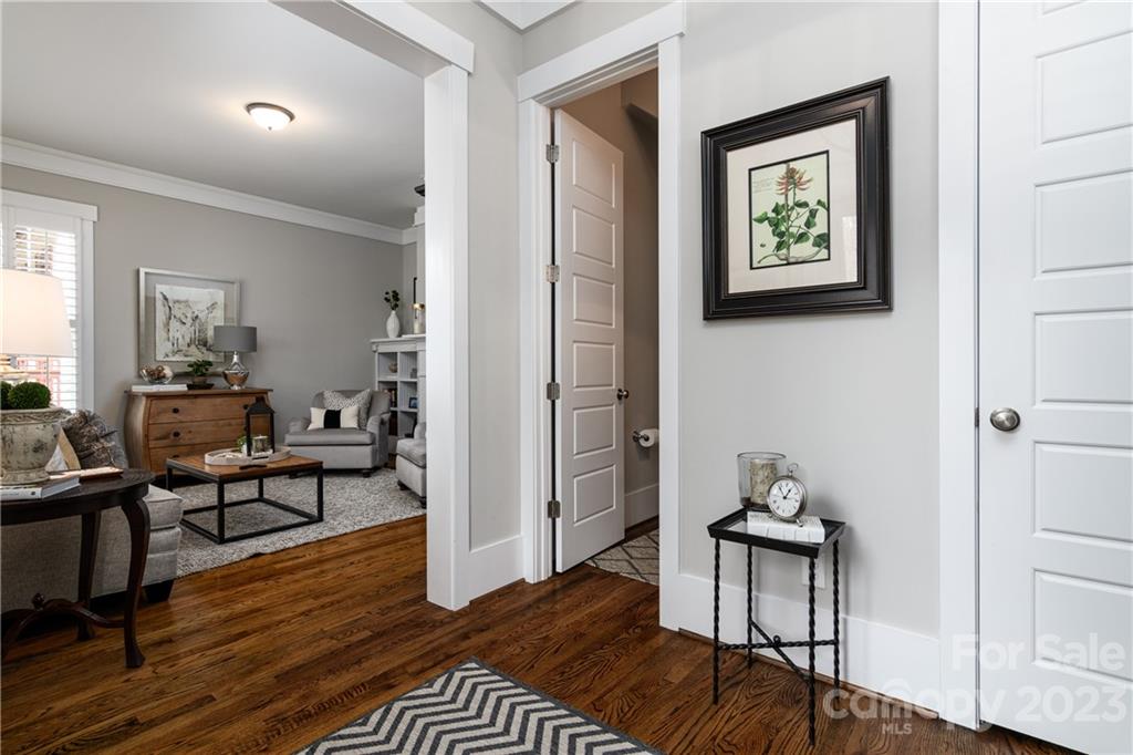 205 Coneflower Place Fort Mill, SC 29708 - Photo 5 of 38 a view of a livingroom with furniture and wooden floor