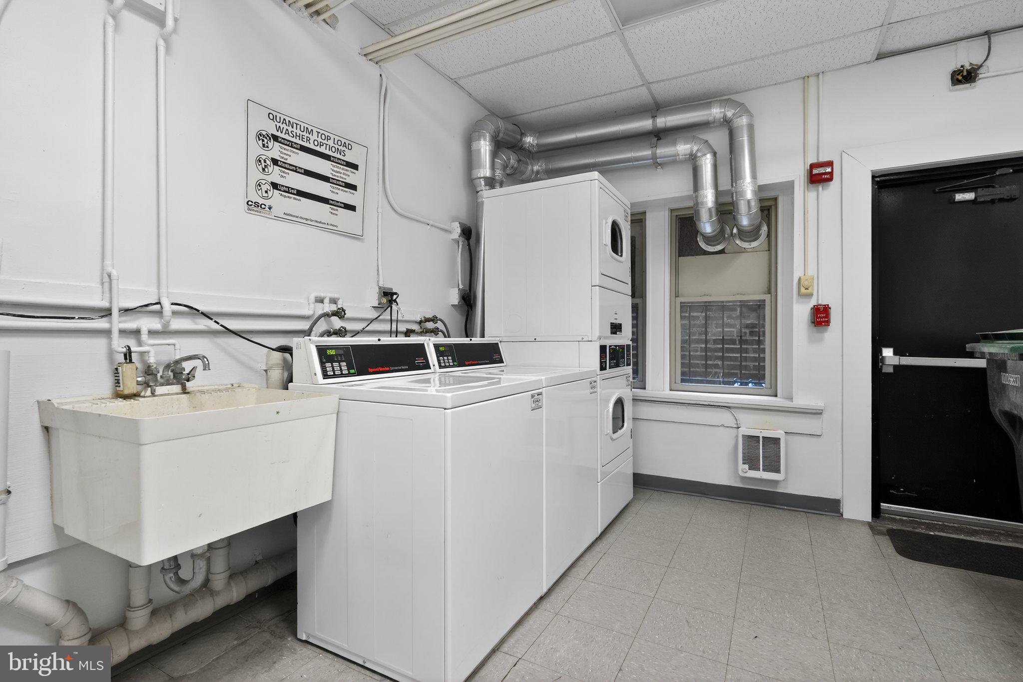 2010 Kalorama Road Northwest, Unit 304 Washington, DC 20009 - Photo 18 of 23 Efficient laundry space with modern appliances.