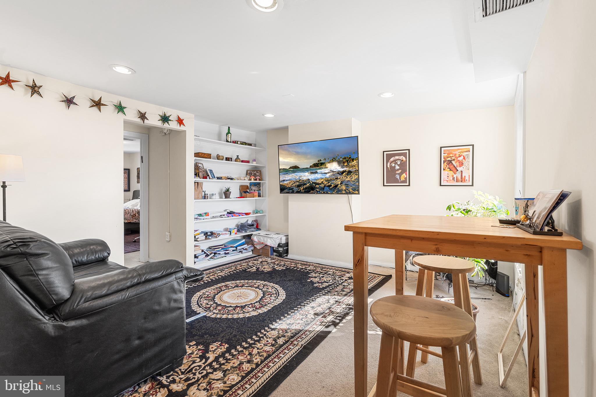 1712 Pine Street Philadelphia, PA 19103 - Photo 25 of 33 a living room with furniture and wooden floor